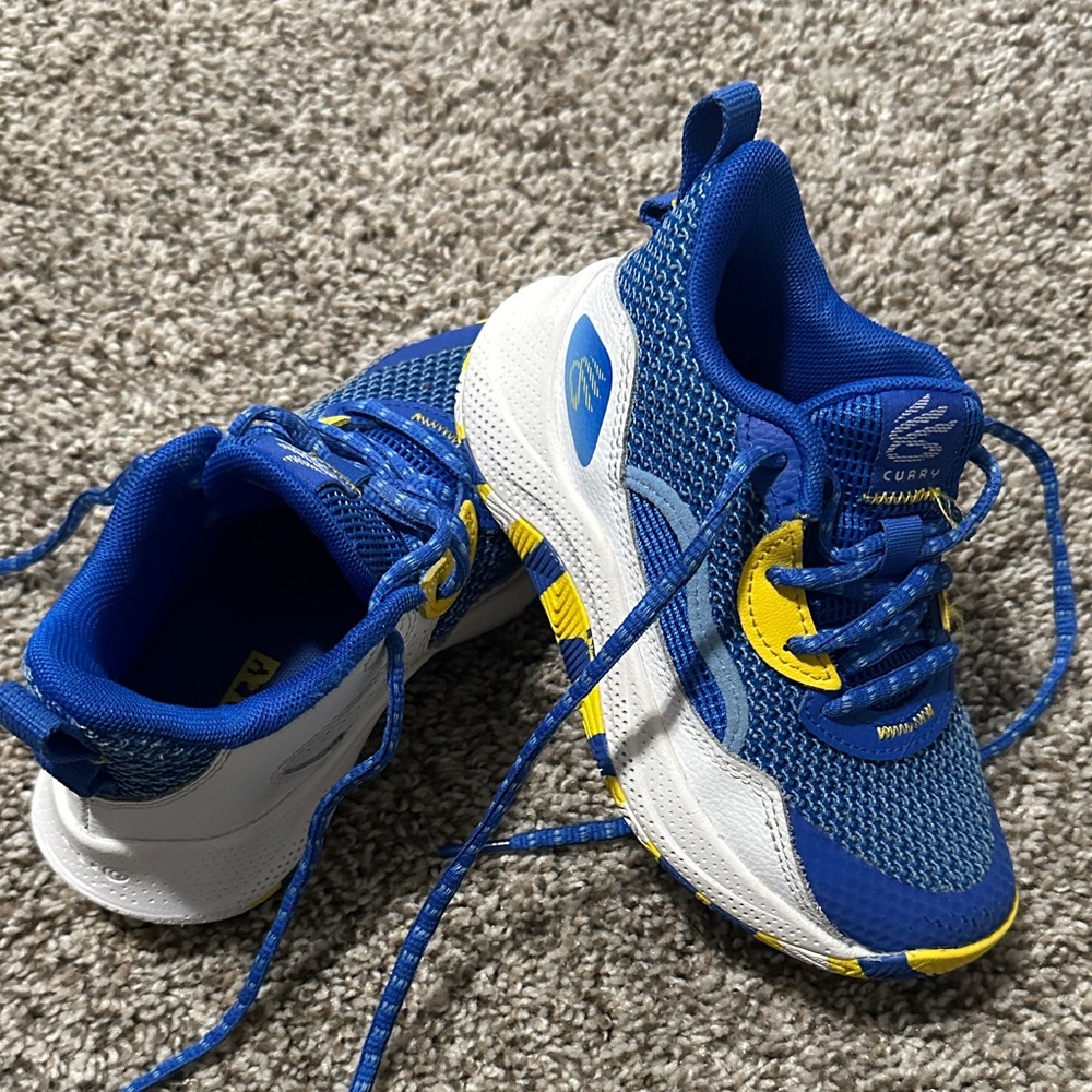 Under Armour Curry Blue and Yellow basketball shoes